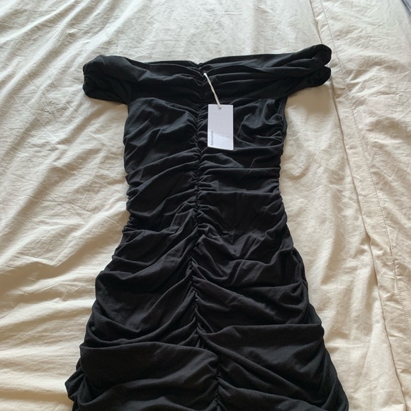 Reformation Dresses & Skirts - Reformation Small NWT black ruched off the shoulder mini